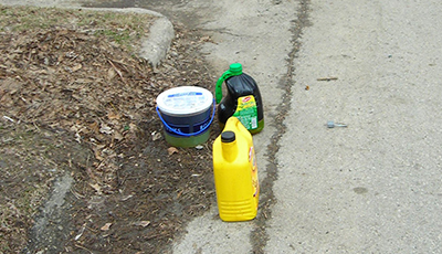 Chemical canisters left in road